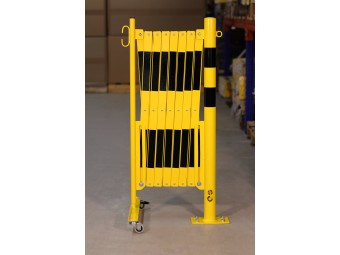 Barrière extensible en acier avec poteau sur platine fixe